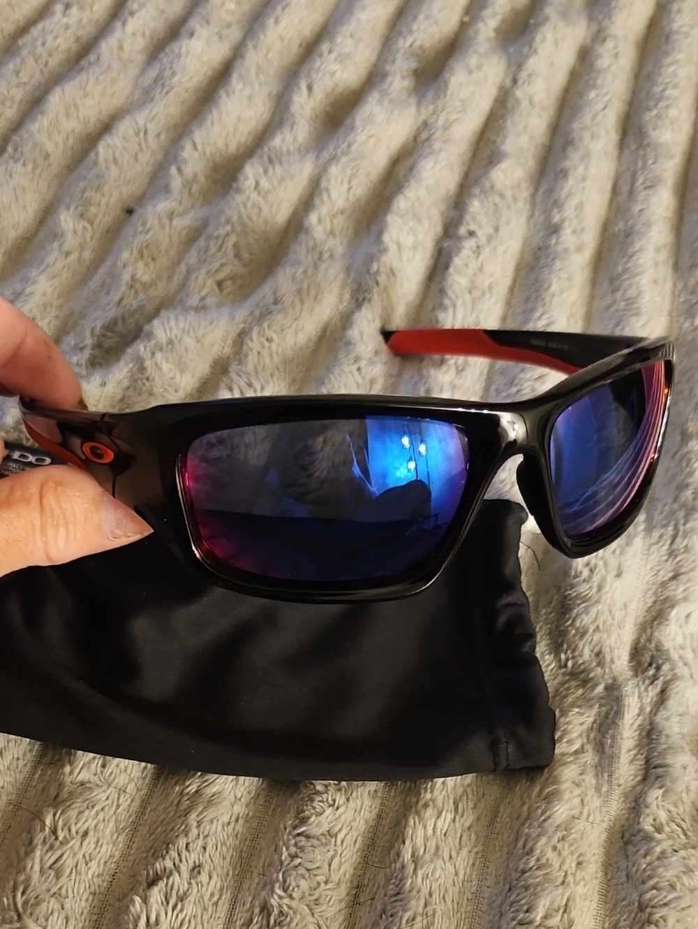 Oakley Valve Sunglasses With The Oakley Valve With red iridium lenses.